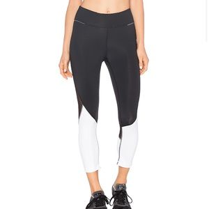 NWT ALALA Captain Crop Tight